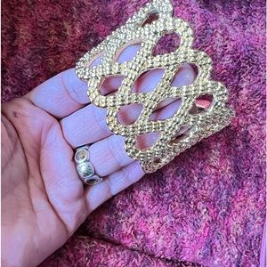 Costume cuff bracelet in gold. New - never worn.
